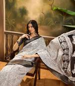 Women's white silk cotton printed saree with unstitched blouse piece