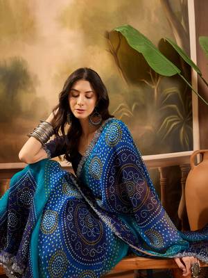 Women's blue georgette bandhni saree with unstitched blouse piece 1