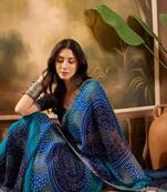 Women's blue georgette bandhni saree with unstitched blouse piece