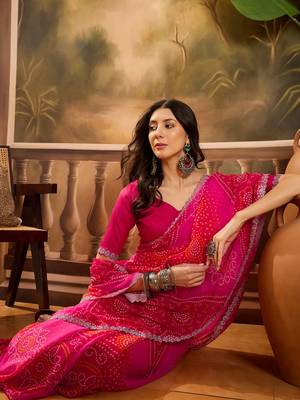 Women's pink georgette bandhni saree with unstitched blouse piece 1