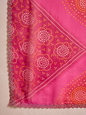 Women's pink georgette bandhni saree with unstitched blouse piece 5