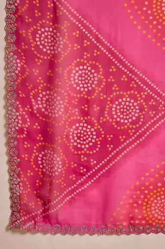 Women's pink georgette bandhni saree with unstitched blouse piece