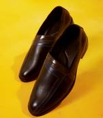 Solid brown leather loafers