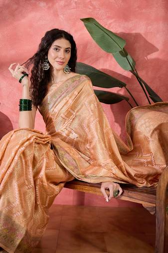 Women's peach silk rangkat bandhani work saree with unstitched blouse piece