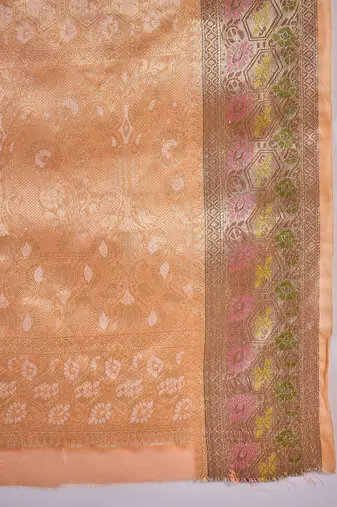 Women's peach silk blend rangkat bandhani work saree with unstitched blouse piece