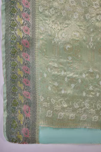Women's sky blue silk blend rangkat bandhani work saree with unstitched blouse piece