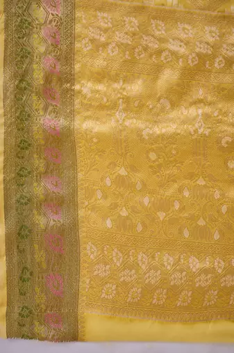 Women's yellow silk blend rangkat bandhani work saree with unstitched blouse piece