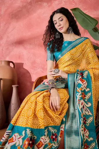 Women's mustard silk blend bandhani work saree with unstitched blouse piece
