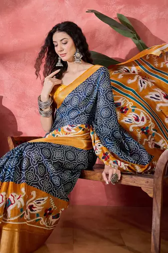 Women's navy blue silk blend bandhani work saree with unstitched blouse piece
