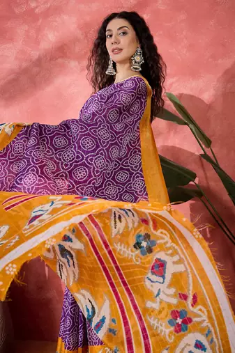 Women's purple silk blend bandhani work saree with unstitched blouse piece