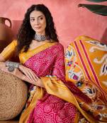 Women's rani silk blend bandhani work saree with unstitched blouse piece