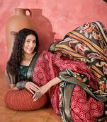 Women's red silk blend bandhani work saree with unstitched blouse piece