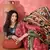 Women's red silk blend bandhani work saree with unstitched blouse piece