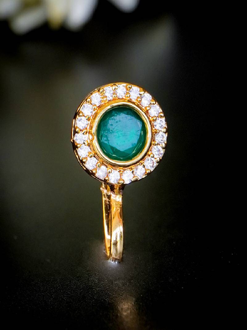 Classic round nath with emerald center and cz border
