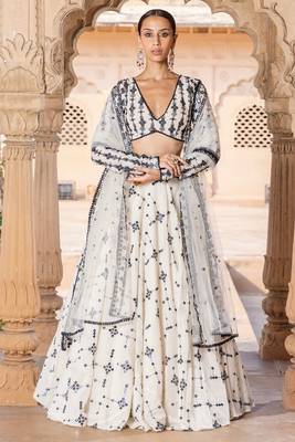 WHITE SEQUIN EMBROIDERED COTTON SILK A LINE LEHENGA CHOLI WITH DUPATTA. 1