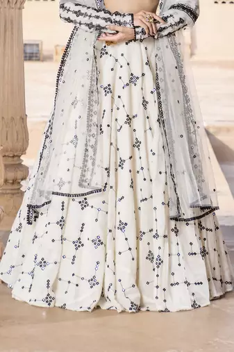 WHITE SEQUIN EMBROIDERED COTTON SILK A LINE LEHENGA CHOLI WITH DUPATTA.