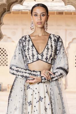 WHITE SEQUIN EMBROIDERED COTTON SILK A LINE LEHENGA CHOLI WITH DUPATTA. 4