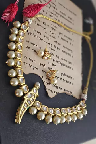 Avyana kundan bird choker set with semi-precious pearls