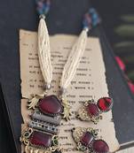 Avira long necklace set with maroon gemstone and peacock pendant