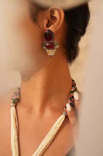 Avira long necklace set with maroon gemstone and peacock pendant