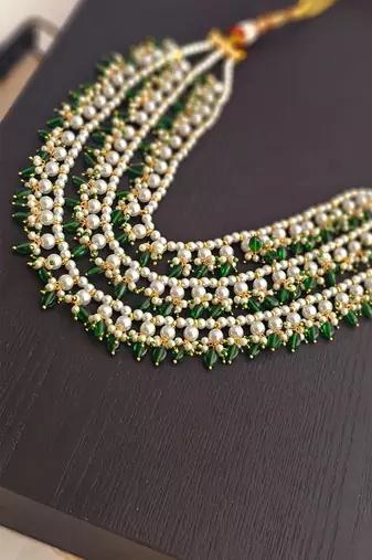 White pearls and green duldul beads layered necklace