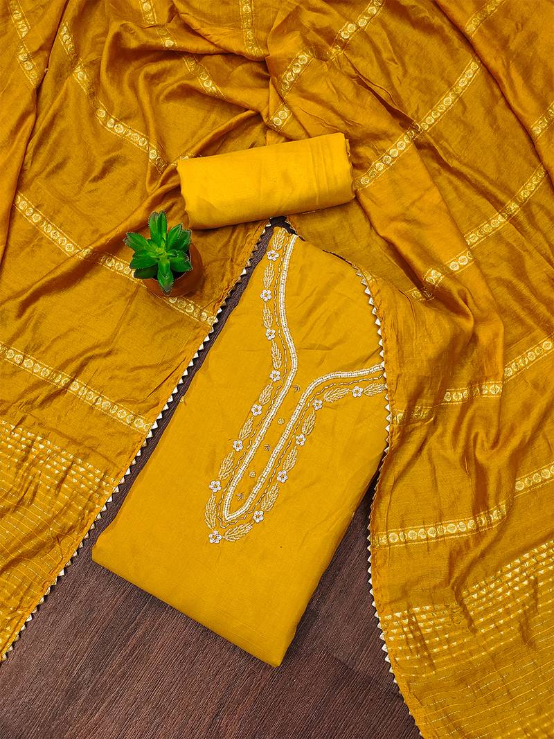 Purple unstitched handwork and fancy border parampara cotton dress material