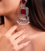 Red stone dangle earrings