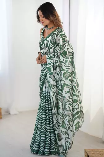 Lovely green printed designer saree with blouse