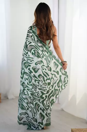 Lovely green printed designer saree with blouse