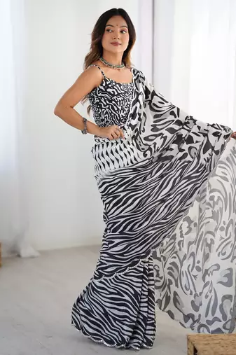Gorgeous black chinon mirror cut work saree with blouse