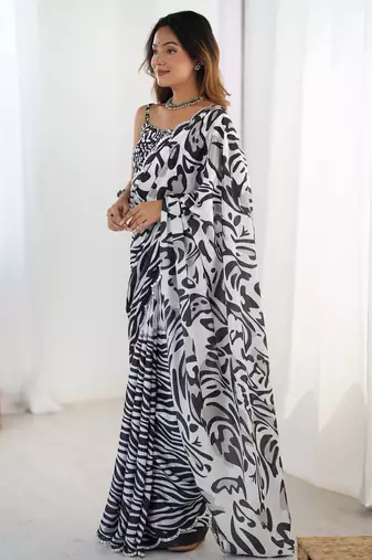 Gorgeous black chinon mirror cut work saree with blouse