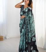 Glamourous black chinon party wear saree with blouse