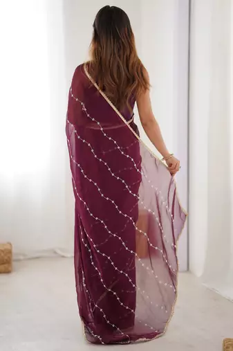 Gorgeous wine beads work chiffon saree with blouse