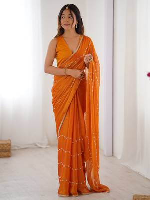 Glamorous orange sequins sangeet wear saree with blouse 1