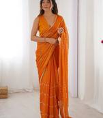 Glamorous orange sequins sangeet wear saree with blouse
