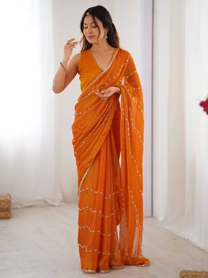 Glamorous orange sequins sangeet wear saree with blouse 2