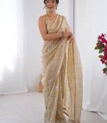 Gorgeous beige organza beads work saree with blouse