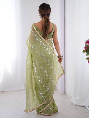 Adorable pista green sequins organza saree with blouse 4