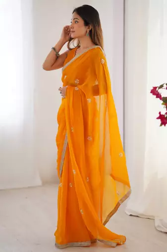 Majestic orange silk sequins haldi wear saree with blouse