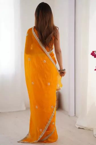 Majestic orange silk sequins haldi wear saree with blouse