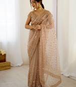 Gorgeous gold net sequins party wear saree with blouse