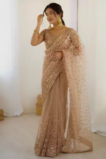 Gorgeous gold net sequins party wear saree with blouse