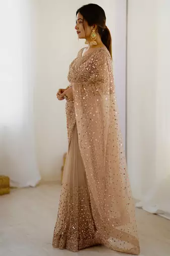 Gorgeous gold net sequins party wear saree with blouse