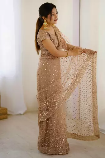 Gorgeous gold net sequins party wear saree with blouse