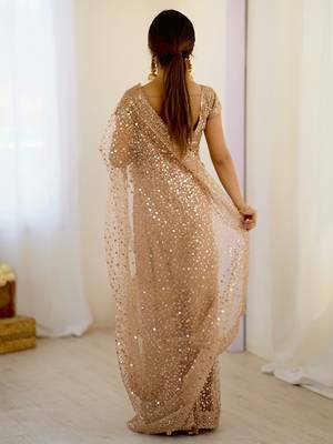 Gorgeous gold net sequins party wear saree with blouse 5