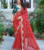 red bandhani print bridal saree with blouse