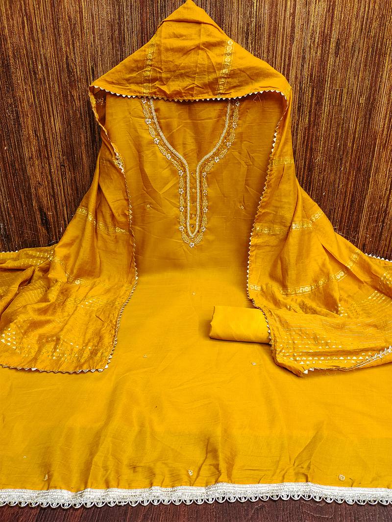 Purple unstitched handwork and fancy border parampara cotton dress material