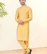 Yellow silk plain kurta pyjama for mens wear