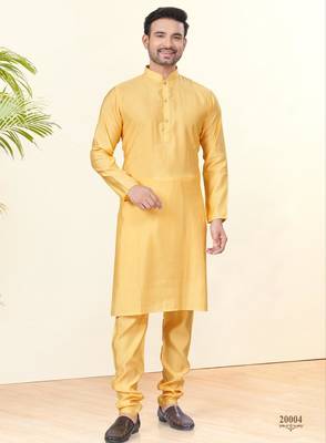 Yellow silk plain kurta pyjama for mens wear 2
