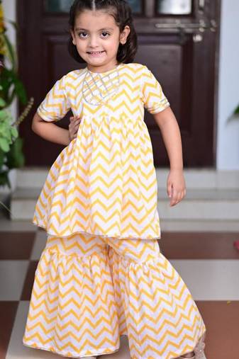 Yellow chevron block printed cotton sharara kurta set with gota embroidery for girl